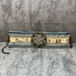 One of a kind Jean bracelet cuff with vintage lace, tape measure and bling